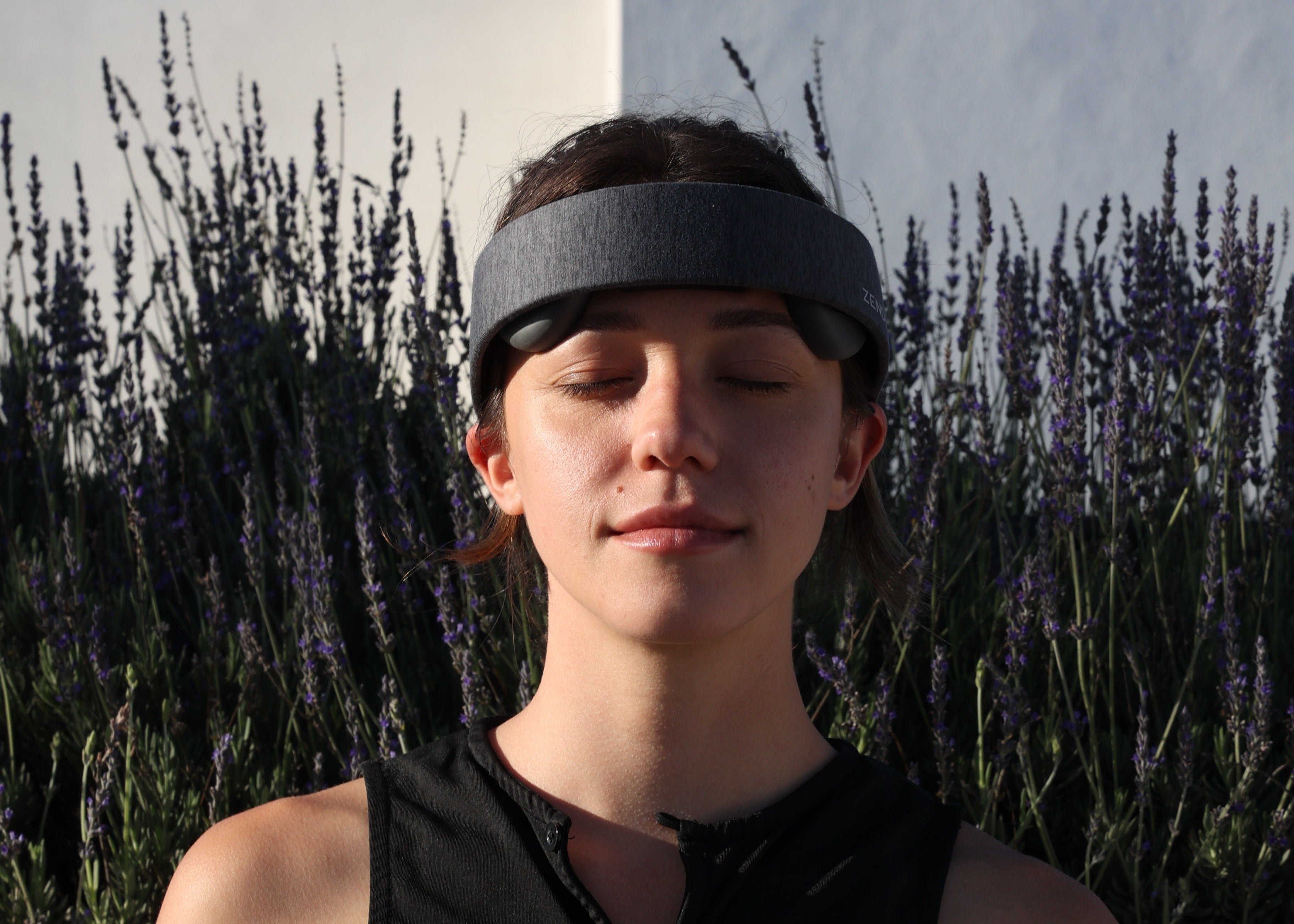 A person wearing the Zendo headband